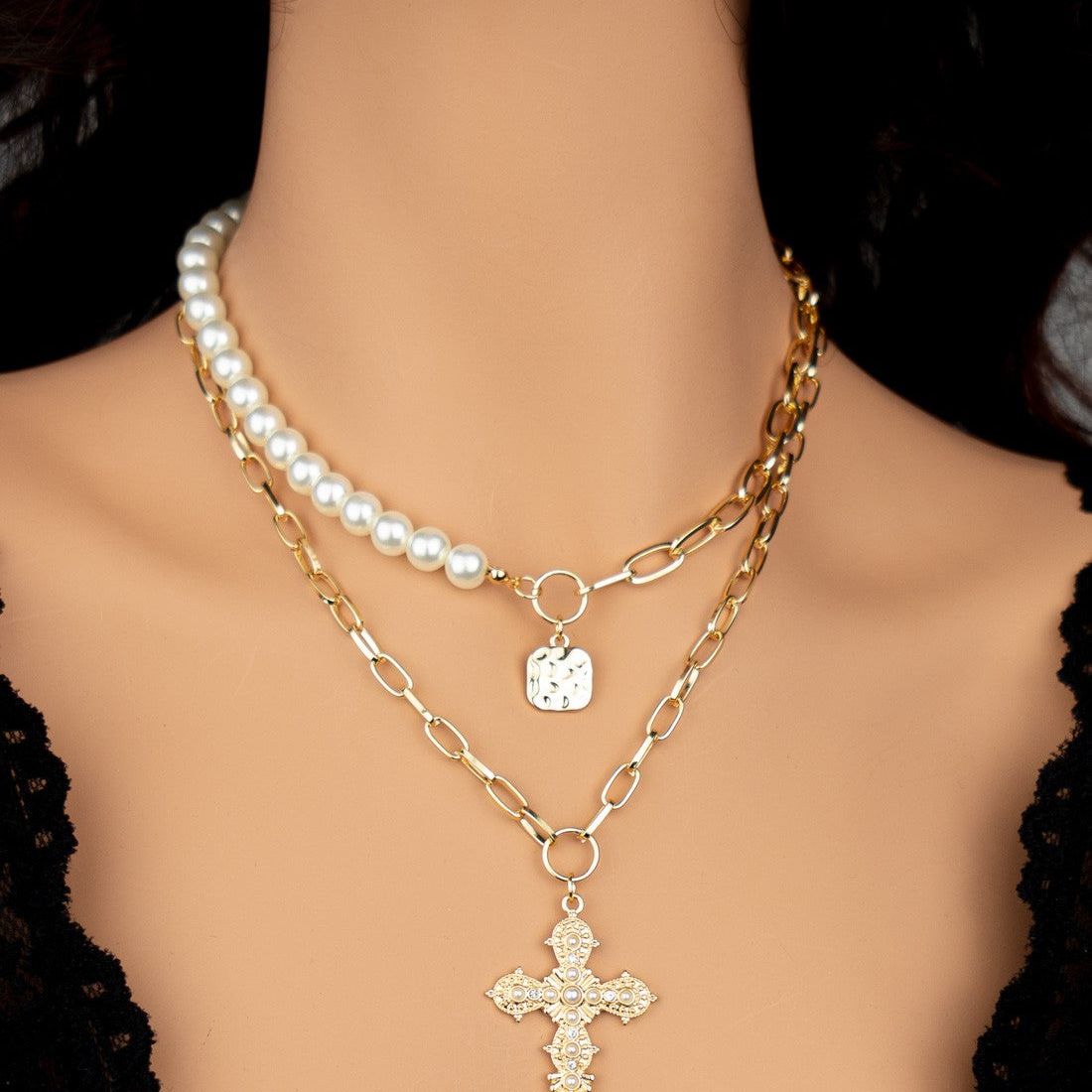 TWO NECKLACES SET WITH PEARL AND CROSS