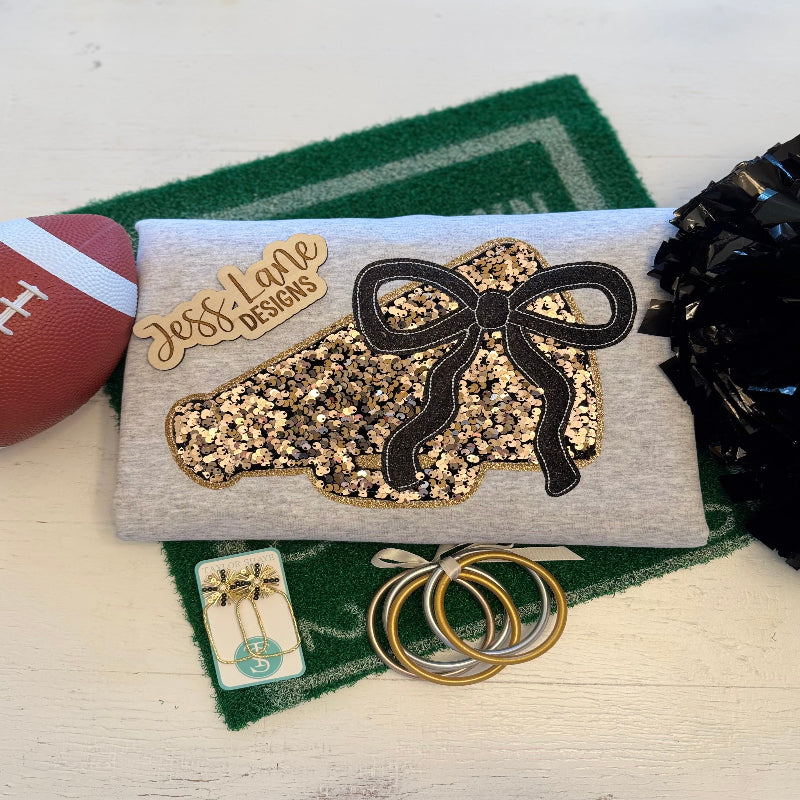Embroidered gold sequins cheer megaphone with black glitter bow