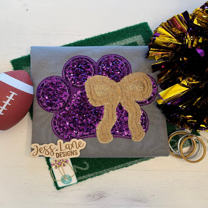Embroidered purple sequins paw with gold bow shirt 
