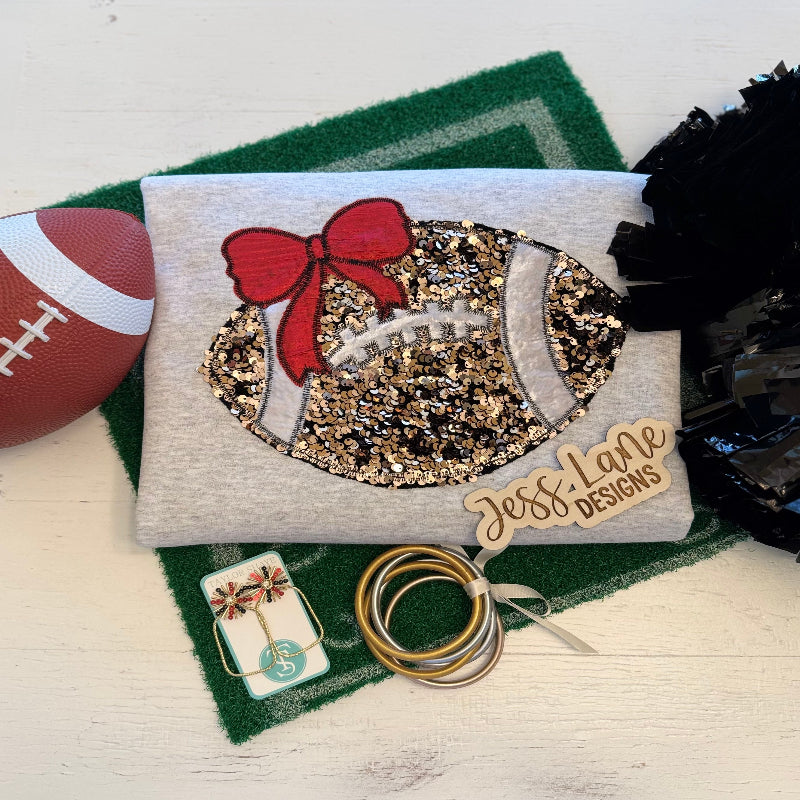 Embroidered gold sequins football with red bow shirt 