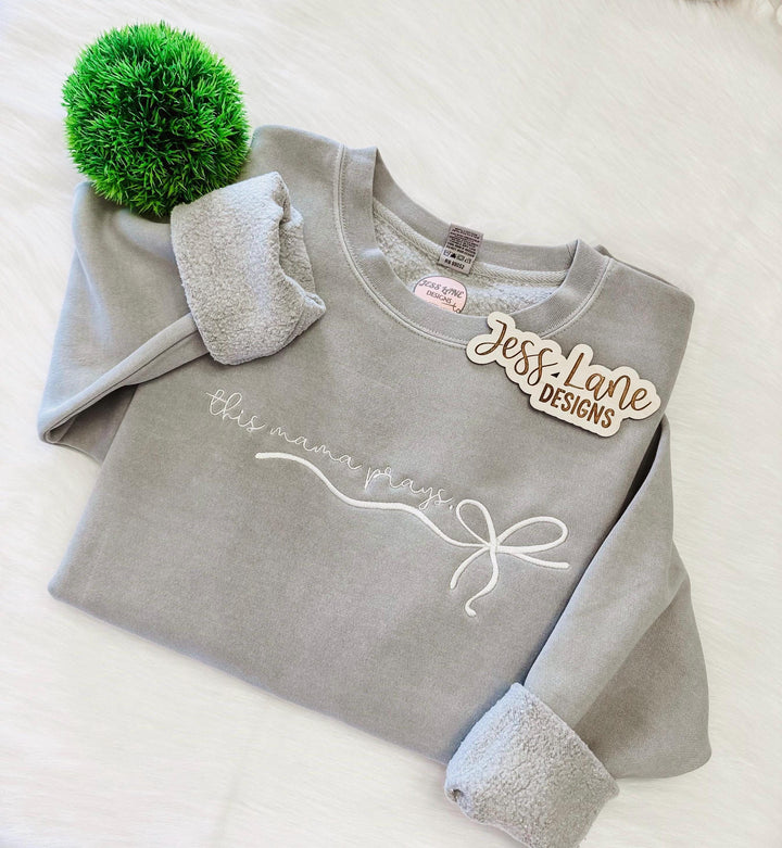 this mama prays embroidered sweatshirt. independent trading