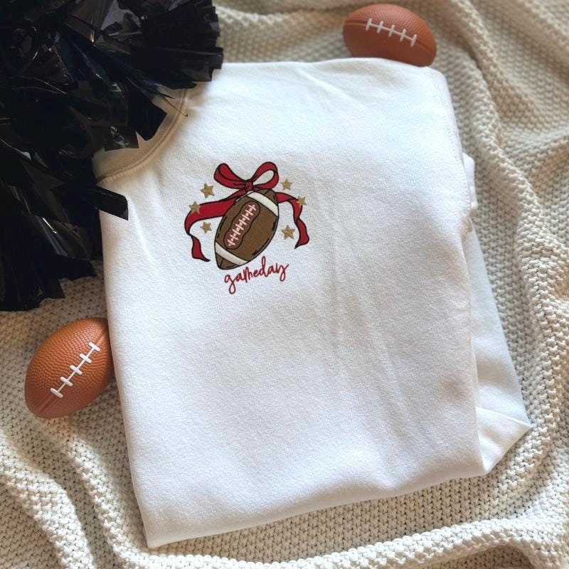 embroidered football and bow left chest sweatshirt