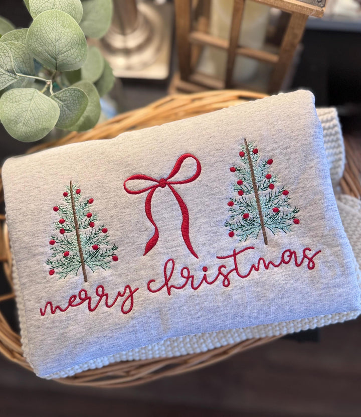 ash gray Gildan sweatshirt with embroidered Christmas trees, bow and merry Christmas text