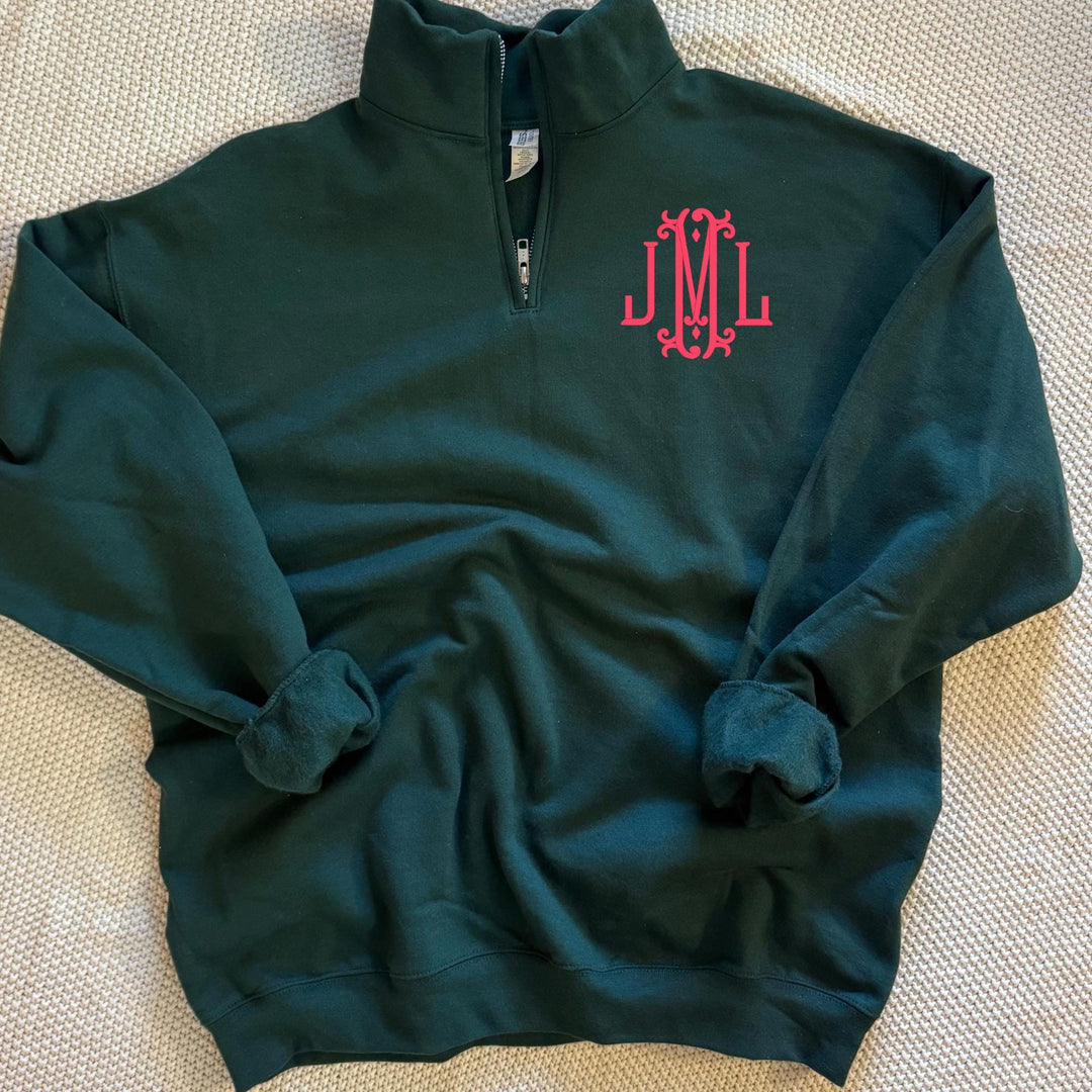 forest green quarter zip sweatshirt with bright pink embroidered monogram left chest, personalized women’s monogram pullover.